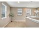 Upstairs hallway, light carpet and bright windows at 17084 Harbor Oak Pkwy, Winter Garden, FL 34787