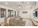 Bright living room with recessed lighting, ceiling fan, large sectional sofa, and sliding glass doors to the lanai at 17084 Harbor Oak Pkwy, Winter Garden, FL 34787