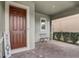 Cozy front porch with brick flooring and a sitting area, perfect for relaxing at 17084 Harbor Oak Pkwy, Winter Garden, FL 34787