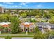 A high angle view of a multi-Gathering and single Gathering neighborhood, featuring mature trees and lush landscaping at 1745 Indiana Ave # J, Winter Park, FL 32789