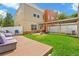 Spacious backyard with lush grass, a deck, and comfortable lounge seating at 1745 Indiana Ave # J, Winter Park, FL 32789