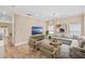 Spacious living room with hardwood floors, comfortable seating, and plenty of natural light at 1745 Indiana Ave # J, Winter Park, FL 32789