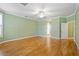 Large bedroom with hardwood floors and ample space at 17631 Vista Belle Ct, Montverde, FL 34756