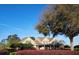 Charming two-story home featuring a covered porch and a beautifully landscaped front yard at 17631 Vista Belle Ct, Montverde, FL 34756