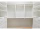 Walk-in closet with custom shelving and drawers at 17631 Vista Belle Ct, Montverde, FL 34756