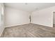 Spacious primary bedroom featuring neutral walls, plush carpeting and natural light at 1915 Terrapin Rd, Ocoee, FL 34761