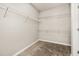 Walk-in closet with wire shelving and neutral carpet at 1915 Terrapin Rd, Ocoee, FL 34761