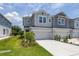 Charming two-story townhouse with a one-car garage and well-maintained landscaping at 1915 Terrapin Rd, Ocoee, FL 34761