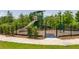 Community playground with a slide, monkey bars, and a swing set at 1915 Terrapin Rd, Ocoee, FL 34761