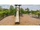 Community playground with a slide, monkey bars, and other climbing structures at 1915 Terrapin Rd, Ocoee, FL 34761