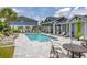 Community pool with lounge chairs and tables for relaxing by the pool at 1915 Terrapin Rd, Ocoee, FL 34761