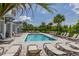 Community pool with lounge chairs for relaxing by the pool at 1915 Terrapin Rd, Ocoee, FL 34761