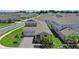 Beautiful two-story home with a brick-paved driveway, two-car garage, and lush landscaping at 2388 Volunteer Ave, Kissimmee, FL 34744