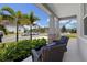 Inviting front porch with comfortable seating and manicured landscaping views at 2388 Volunteer Ave, Kissimmee, FL 34744