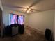 A light-filled bedroom with a ceiling fan at 2558 El Capitan Dr, Sanford, FL 32773