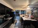 A spacious kitchen and dining area provides access to the living room at 2558 El Capitan Dr, Sanford, FL 32773