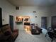 The living room offers plenty of natural light and access to the kitchen at 2558 El Capitan Dr, Sanford, FL 32773