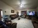 Inviting living room with ceiling fan and tile flooring at 2558 El Capitan Dr, Sanford, FL 32773