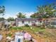 Untidy backyard with building and pool at 2571 Edmond Cir, Auburndale, FL 33823