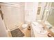 Bright bathroom with white sink and white tile shower at 2788 Almaton Loop # 202, Kissimmee, FL 34747