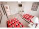bedroom with ceiling fan and two twin beds featuring Mickey Mouse sheets at 2788 Almaton Loop # 202, Kissimmee, FL 34747