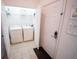Bright laundry room with white washer and dryer machines at 2788 Almaton Loop # 202, Kissimmee, FL 34747