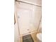Clean shower with gray mat, white tile, and clear glass shower door at 2788 Almaton Loop # 202, Kissimmee, FL 34747