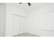 Neutral bedroom featuring a ceiling fan and closet at 2807 Sw 161St Loop, Ocala, FL 34473