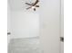 Bedroom featuring neutral walls, a ceiling fan, and tile floors at 2807 Sw 161St Loop, Ocala, FL 34473