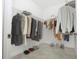 Walk-in closet with ample storage space and tile floors at 2807 Sw 161St Loop, Ocala, FL 34473