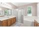 Bright bathroom with a separate shower, soaking tub, and dual sinks at 2827 Park Meadow Dr, Apopka, FL 32703