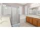 Bright bathroom with a separate shower, soaking tub, and dual sinks at 2827 Park Meadow Dr, Apopka, FL 32703