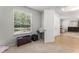 Cozy bedroom features large window, grey walls and neutral floors at 2827 Park Meadow Dr, Apopka, FL 32703