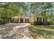 Charming home featuring brick driveway, manicured lawn, double doors and a two car garage at 2827 Park Meadow Dr, Apopka, FL 32703