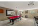 Game room with a pool table, a large mirror, and a projector at 2827 Park Meadow Dr, Apopka, FL 32703