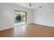 Spacious living room with sliding glass doors leading to a screened patio and pool at 2853 Strand Cir, Oviedo, FL 32765