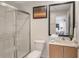 This bathroom features a shower, sink, toilet, and modern decor at 3001 Red Ginger Rd, Kissimmee, FL 34747