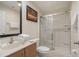 This bathroom features a shower, sink, toilet, and modern decor at 3001 Red Ginger Rd, Kissimmee, FL 34747