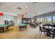 Spacious game room featuring billiard tables, bar, and seating area for entertaining at 3001 Red Ginger Rd, Kissimmee, FL 34747