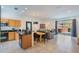 Open layout reveals kitchen with sleek countertops, dining area, and comfortable living space at 3001 Red Ginger Rd, Kissimmee, FL 34747