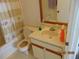 Bathroom with a vanity, mirror, and a combination tub and shower with curtain at 3166 S Semoran Blvd # 1007, Orlando, FL 32822