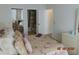 Bedroom featuring a closet and connecting bathroom, designed for comfort and convenience at 3166 S Semoran Blvd # 1007, Orlando, FL 32822