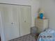 Comfortable bedroom featuring ample closet space and a warm, inviting atmosphere at 3166 S Semoran Blvd # 1007, Orlando, FL 32822