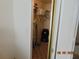 Walk-in closet providing ample storage, including shelving and hanging space at 3166 S Semoran Blvd # 1007, Orlando, FL 32822