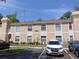 Charming condominium featuring well-maintained landscaping and reserved parking at 3166 S Semoran Blvd # 1007, Orlando, FL 32822