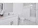 Bright bathroom featuring marble tile, modern fixtures, a shower/tub combination, and a sleek vanity at 348 Famagusta Dr, Davenport, FL 33896