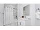 Elegant bathroom featuring marble-like tiling, a modern vanity, and a shower/tub combination at 348 Famagusta Dr, Davenport, FL 33896