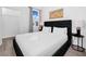 Bright bedroom with a large bed, stylish side tables, and closet at 348 Famagusta Dr, Davenport, FL 33896