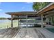 Covered boat house on the lake with boat lifts at 4107 Gabriella Ln, Winter Park, FL 32792