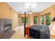 Spacious main bedroom features a fireplace and ample natural light at 4107 Gabriella Ln, Winter Park, FL 32792